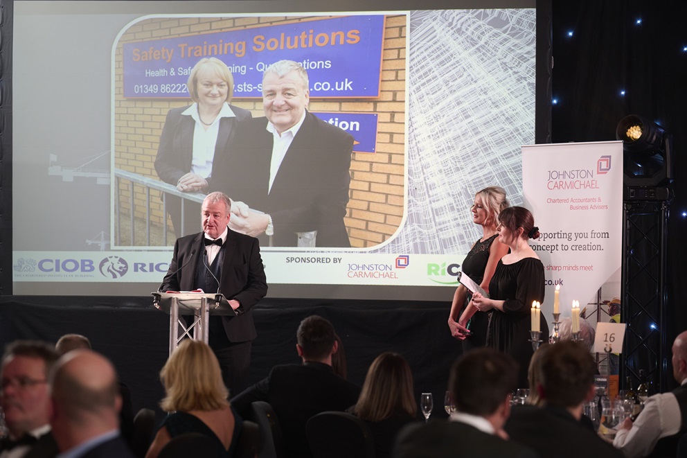 Safety training director lifts excellence award at Inverness event