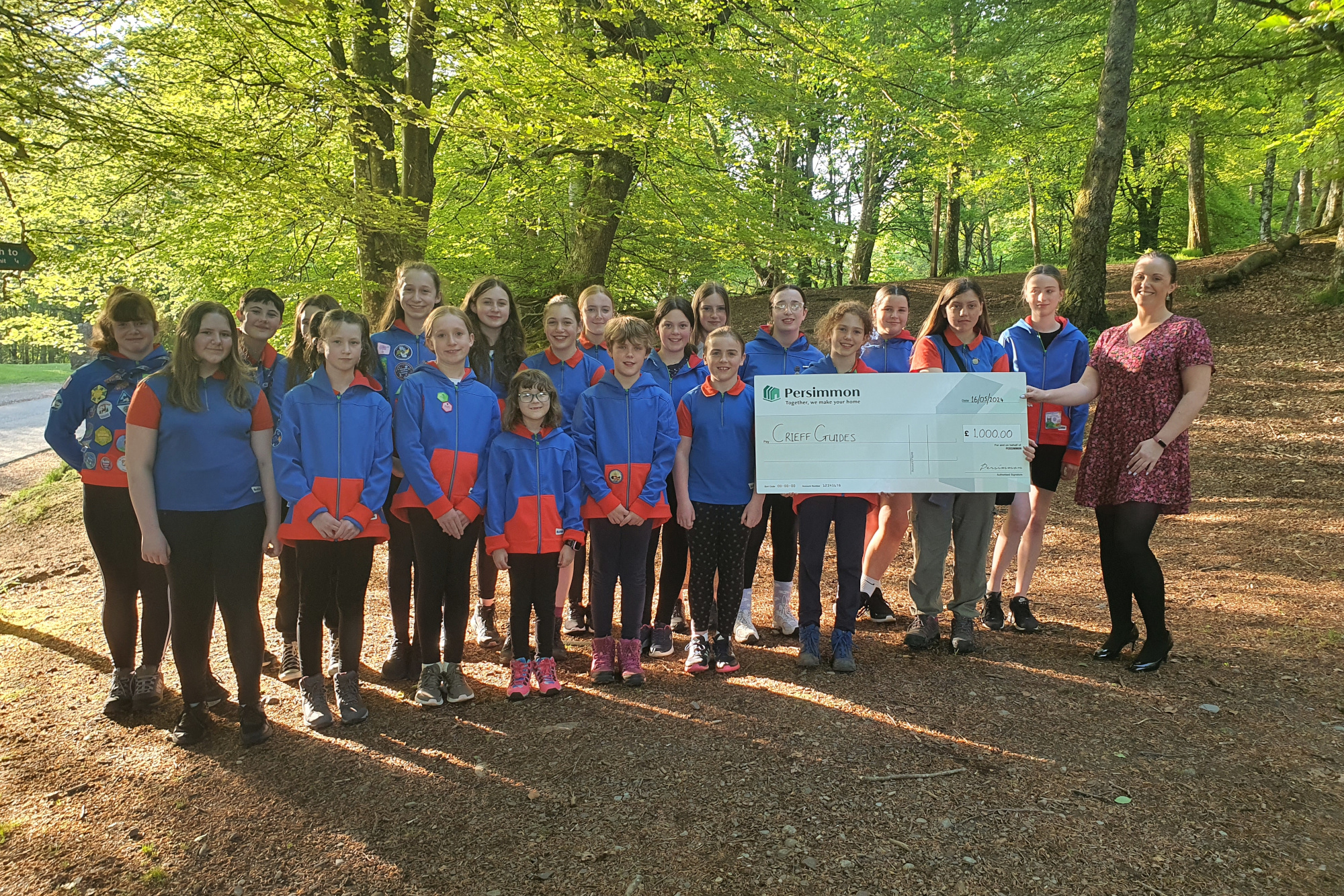 Persimmon North Scotland presents £1,000 donation to 1st Crieff Guides