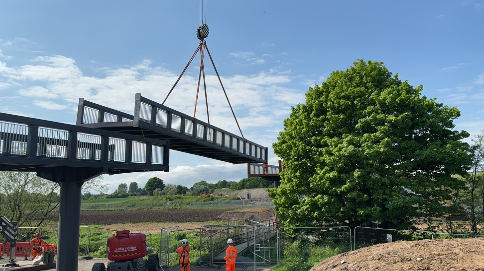 Video: Levenmouth active travel bridge craned into position