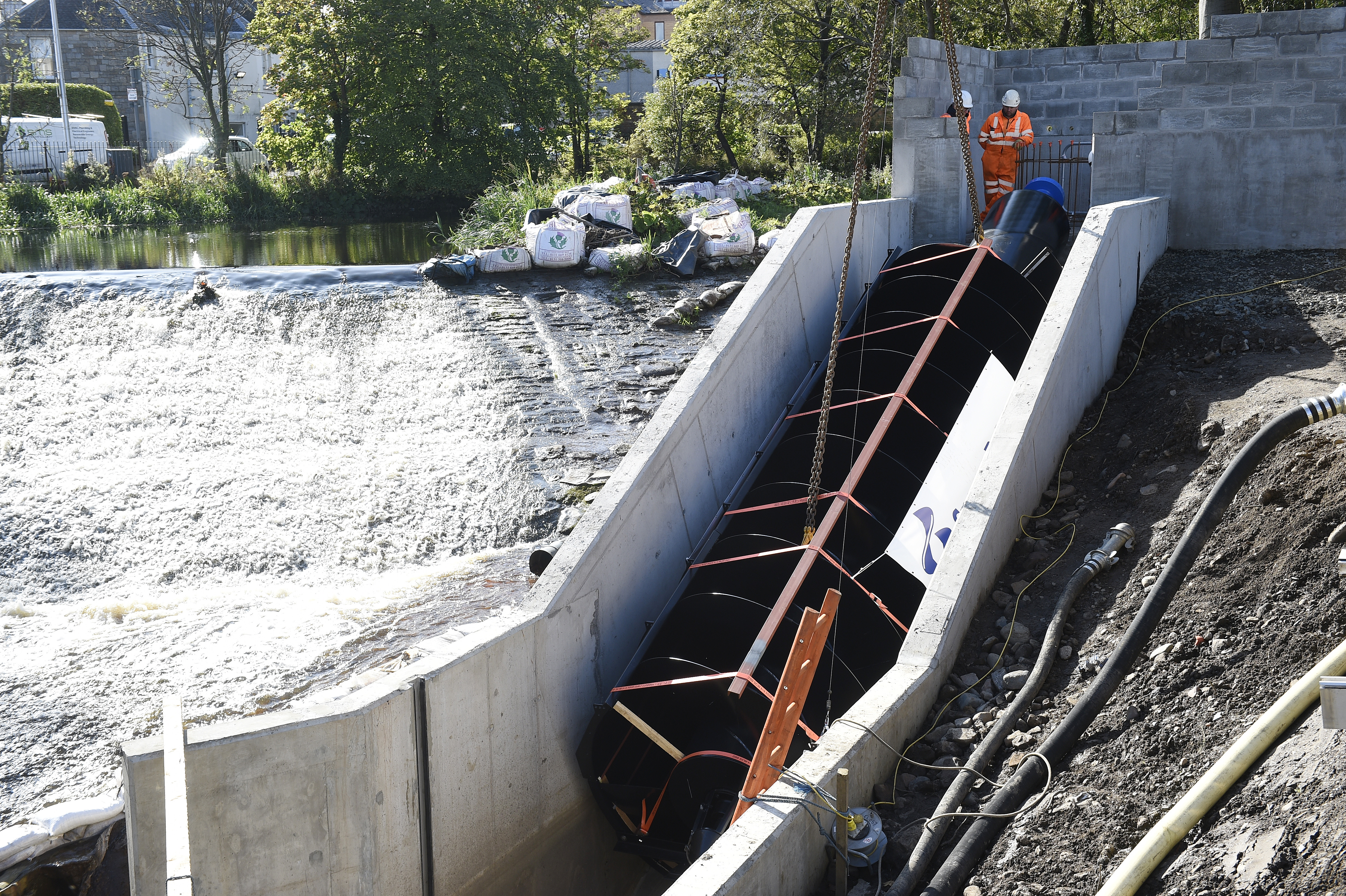 In Pictures: Archimedes screw hoisted into place at Saughton Park micro-hydro  scheme